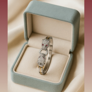 Unisex Italian cut 925 silver bracelet with dual panther heads, ruby-red gemstone eyes, and gold-plated accents in a luxury jewellery box – Adishakti Jewellery