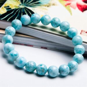 AdiShakti Larimar Bracelet with ocean-blue natural stones, designed for unisex emotional healing, peace, and throat chakra activation.