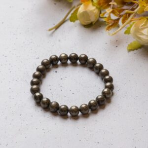 AdiShakti Pyrite Bracelet with natural golden metallic stones, designed for unisex manifestation, confidence, and protection from negative energy.